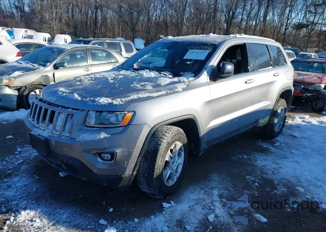 2015 Jeep Grand Cherokee Laredo z USA, uszkodzony, nr VIN 1C4RJFAG4FC912592